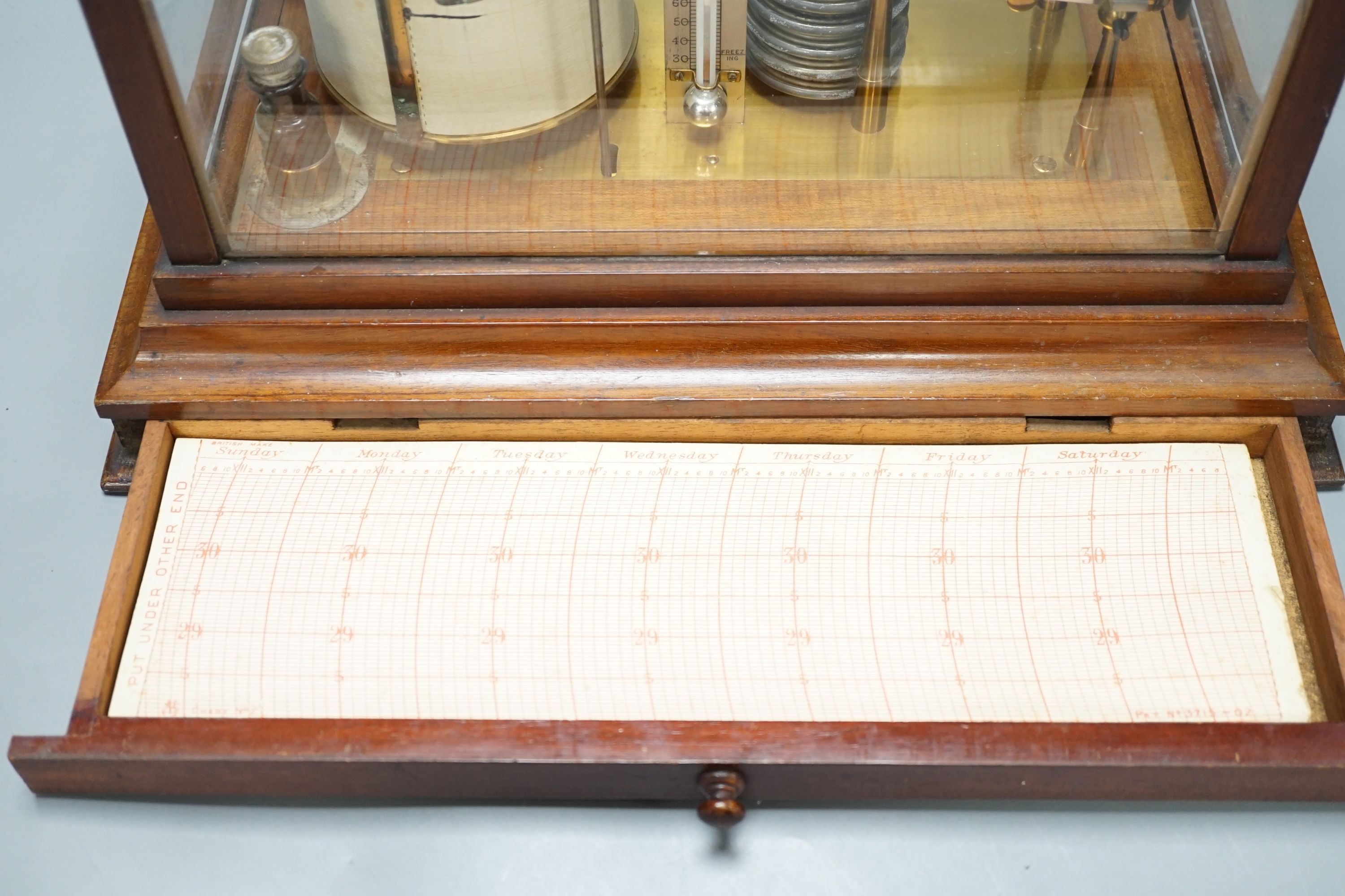 An early 20th century barograph in a mahogany case, 36 cms wide x 21cm high.